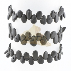 Raw black drop shaped amber bracelet